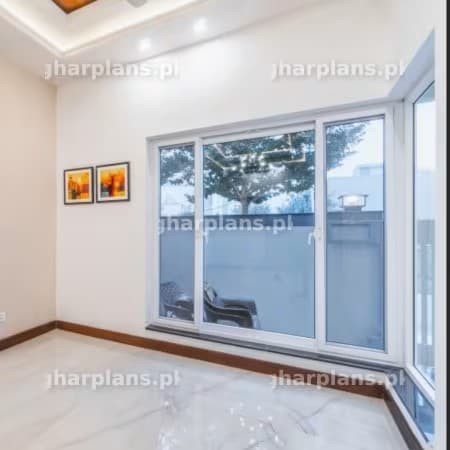 White UPVC windows in small house