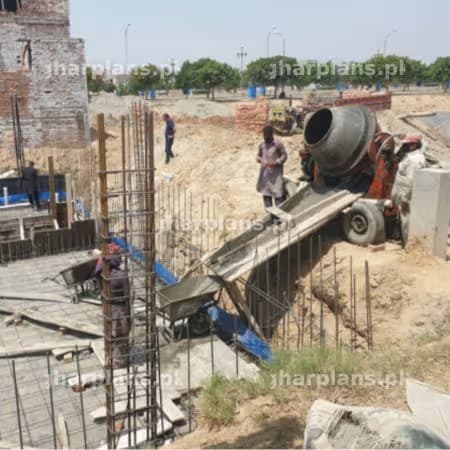 Concrete Being Poured Over for Building Foundation