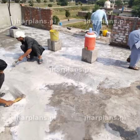 Rooftop waterproofing being carried out