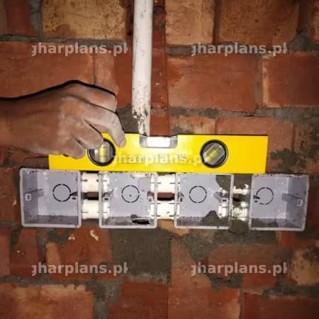 Alignment and Installation of Electrical Switch with Spirit Level