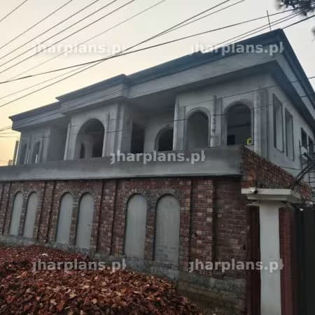 Ongoing Plastering Phase of Construction in Pakistan