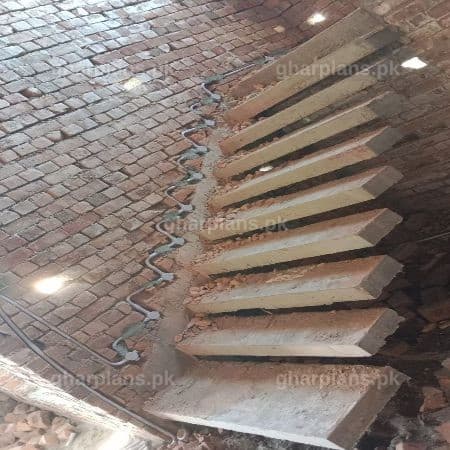 Modern Floating Concrete Stairs: Grey Structure Electrical Piping in Pakistan